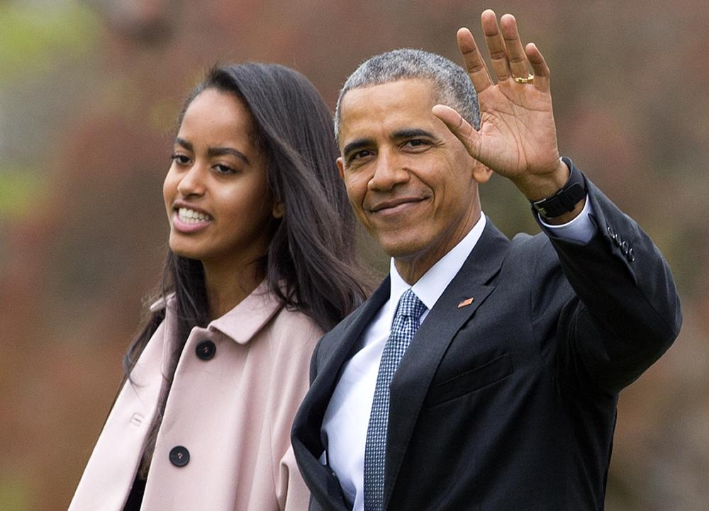 Malia and Barack photo