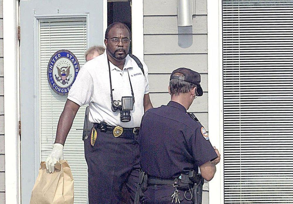 Investigators at office where Scarborough aide died