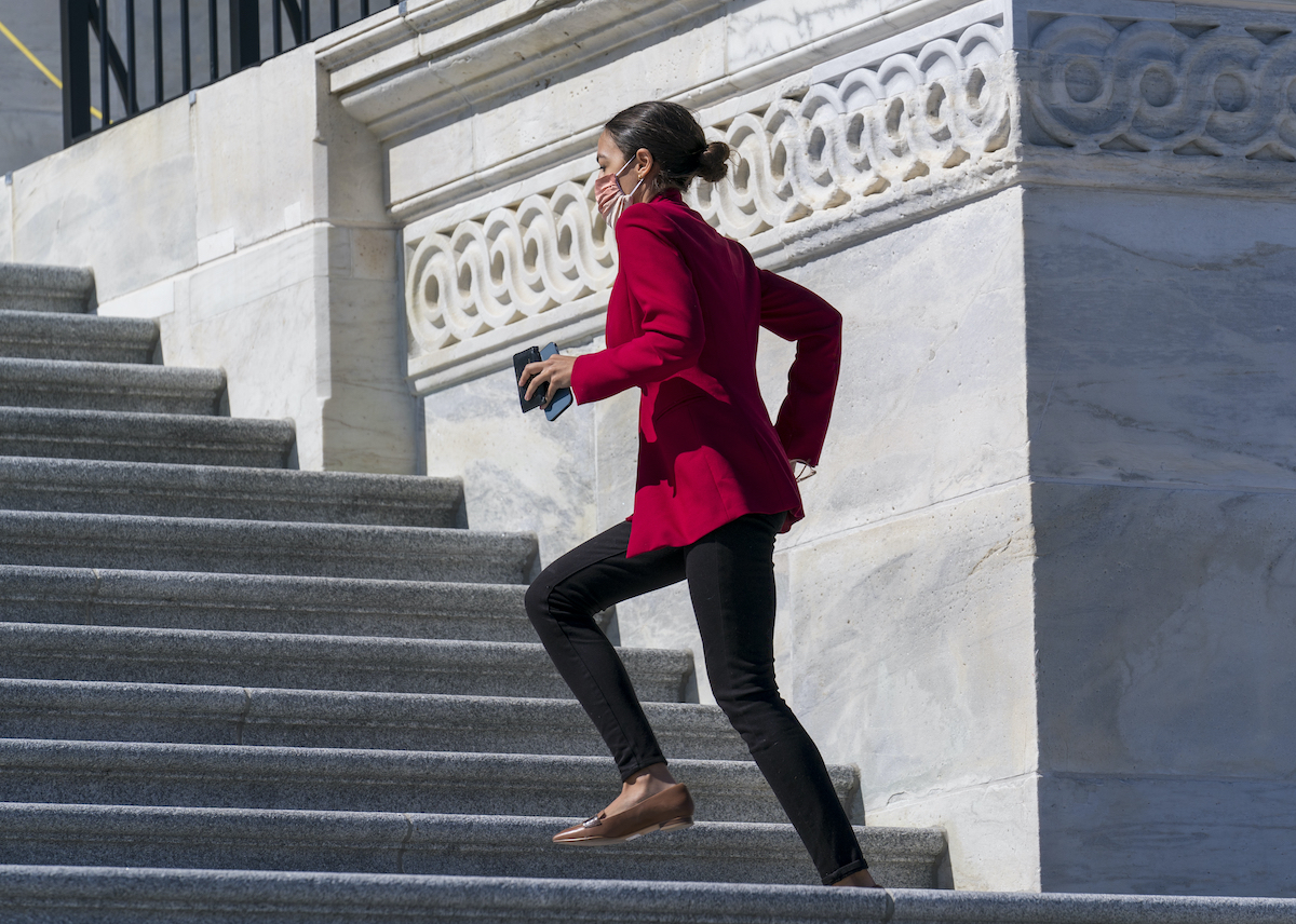 AOC running up Capitol steps 3/3/21