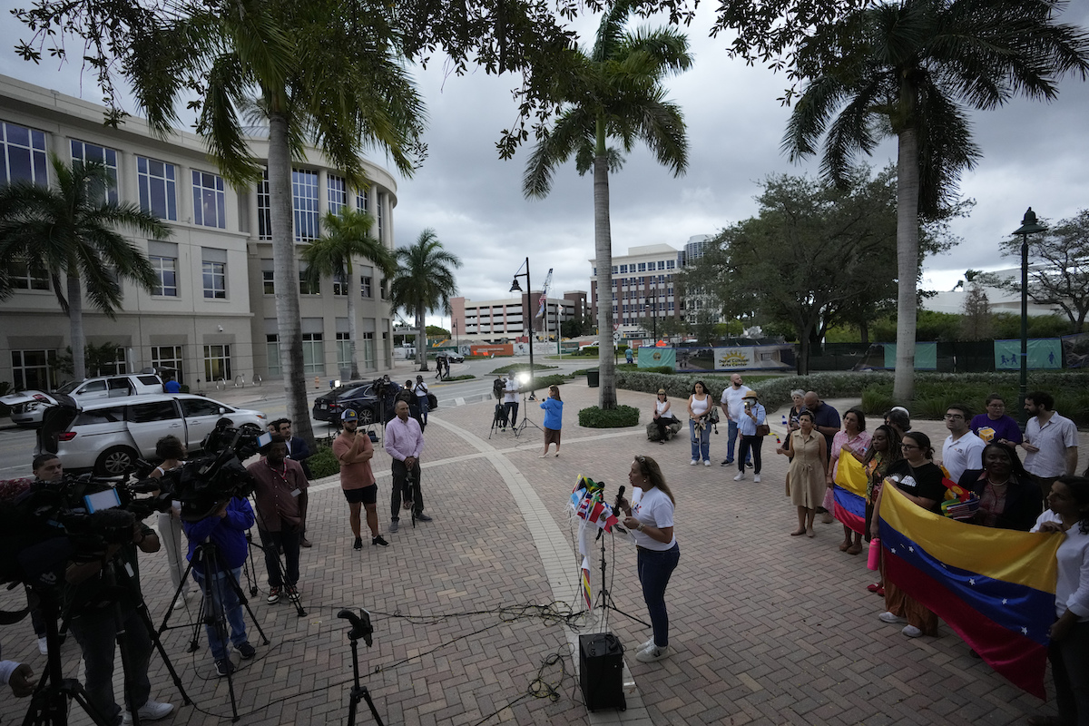 Sept 2022 protest against DeSantis immigration policies Doral FL