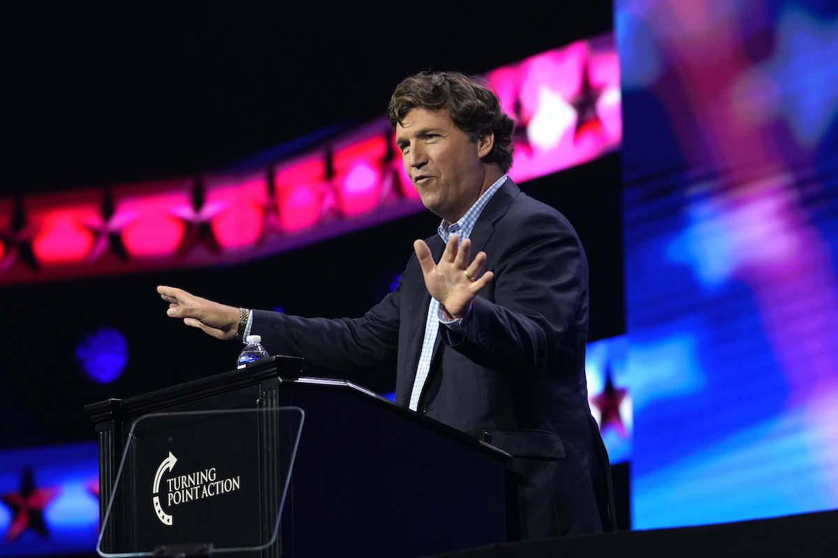 Tucker Carlson speaking at Turning Point Action in West Palm Beach, Fla., 7-15-2023