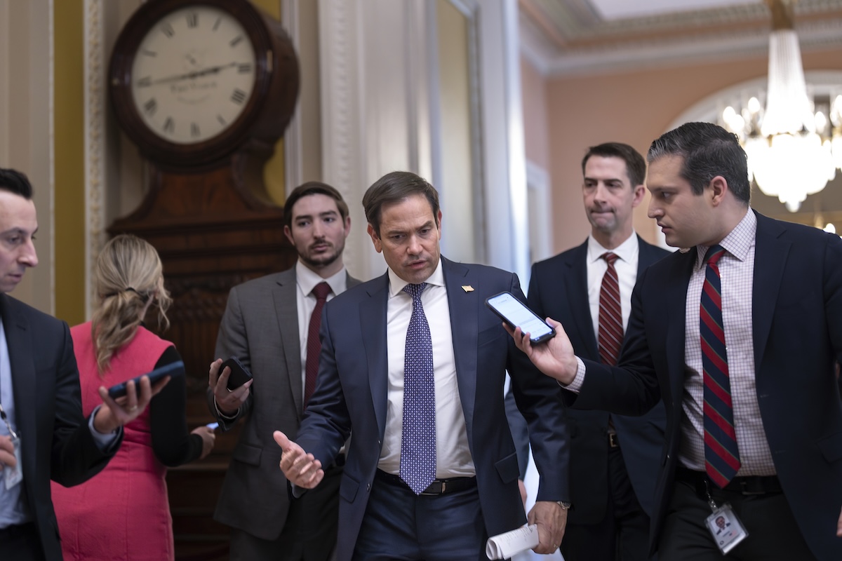 Marco Rubio walking talking to reporters in Washington, 2-7-2024
