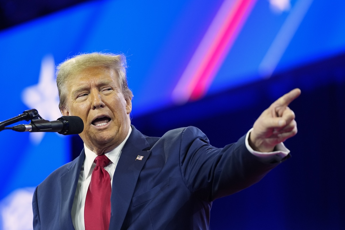 Trump speaks at CPAC Feb. 24, 2024 - Pointing while speaking into mic