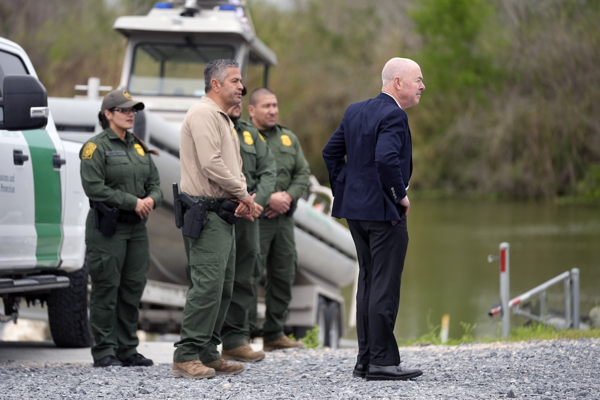 Alejandro Mayorkas at the border with border patrol agents, 2-29-2024
