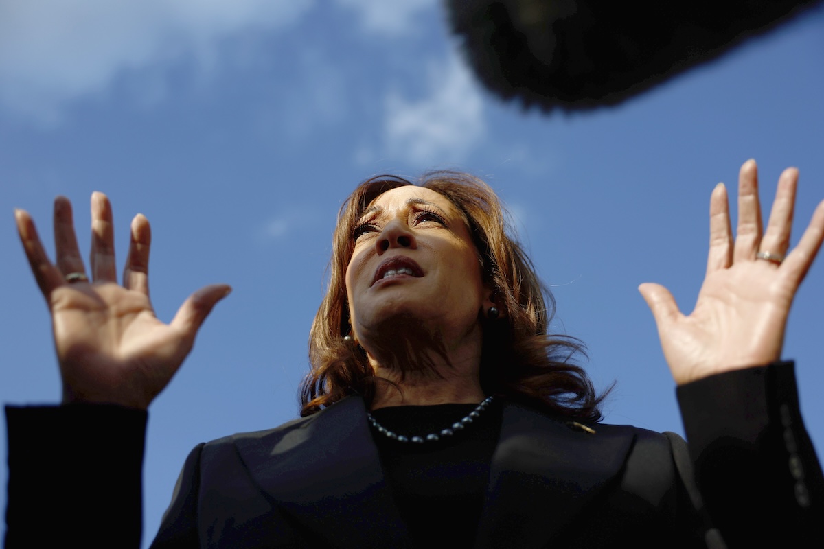 Vice President Kamala Harris seen from below boarding Air Force Two, 10-7-2024