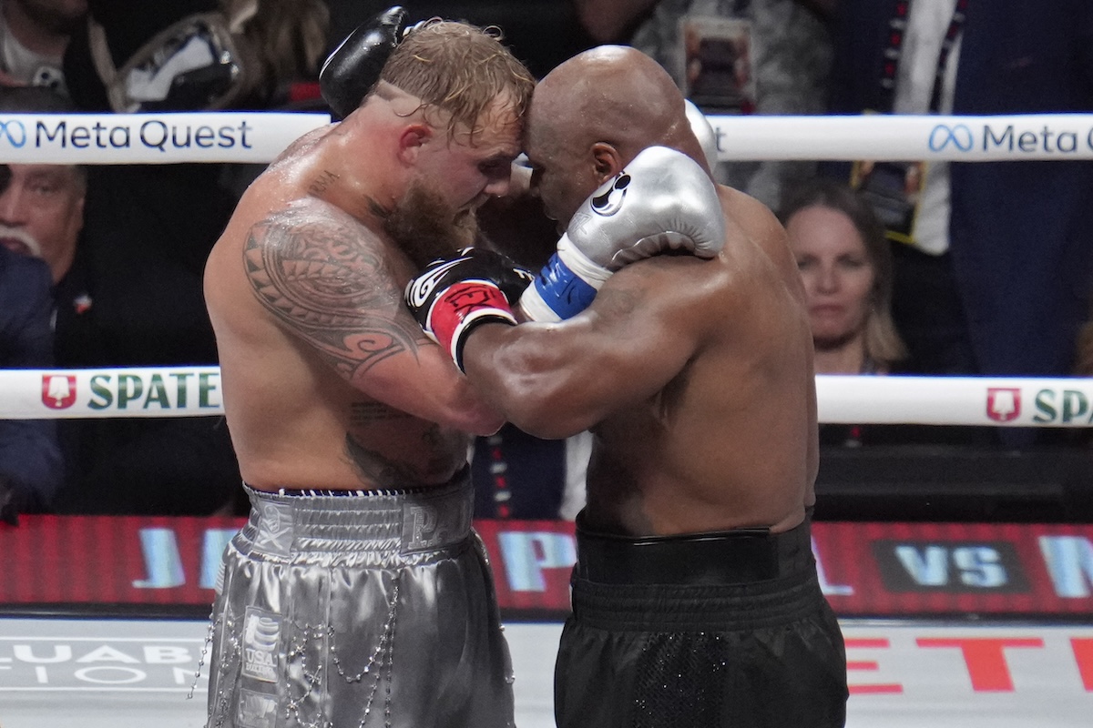 Mike Tyson and Jake Paul embrace after match in Arlington, Texas- 11-19-2024