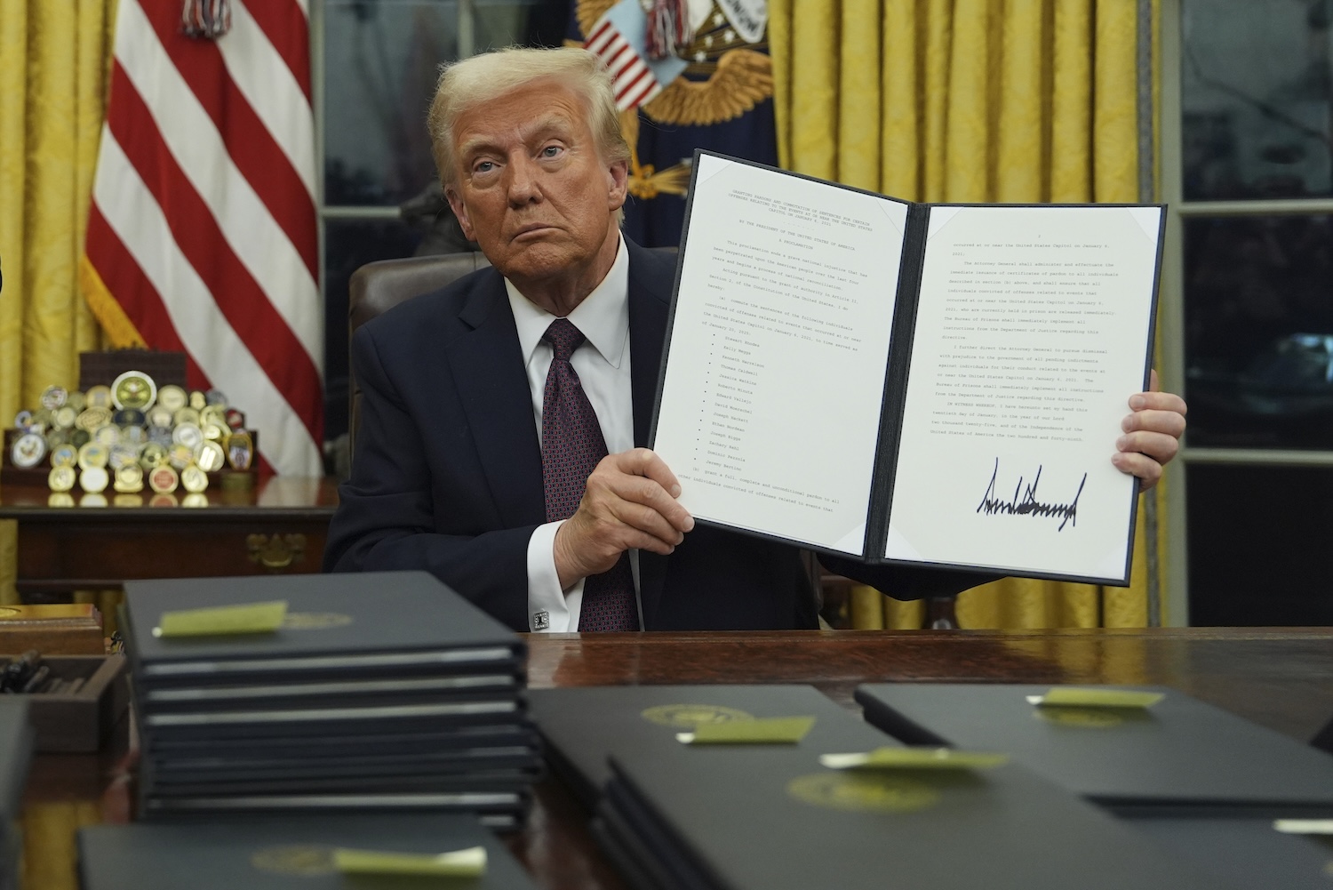 Trump signs Jan. 6 pardons, 01-20-2025