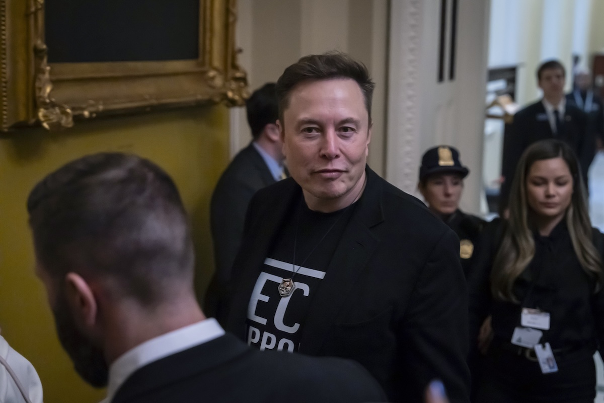 Elon Musk in hallways of Congress March 2025