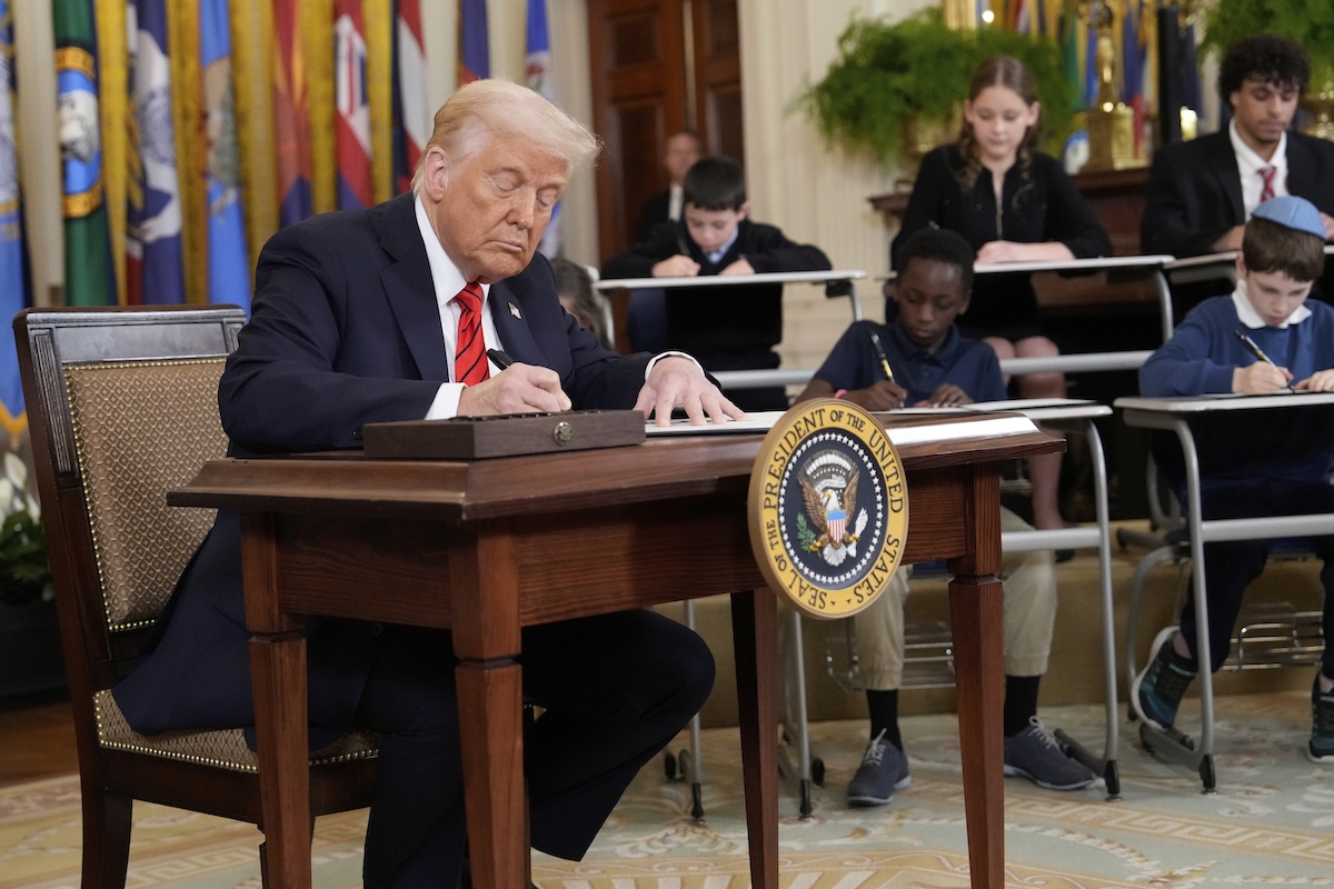 Trump signing order downsizing Education Dept in March 2025