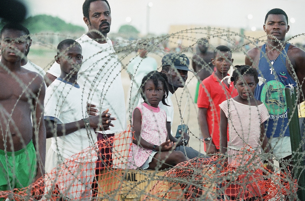 Haitian immigrants in Guantanamo Bay behind barbed wire 9-7-94