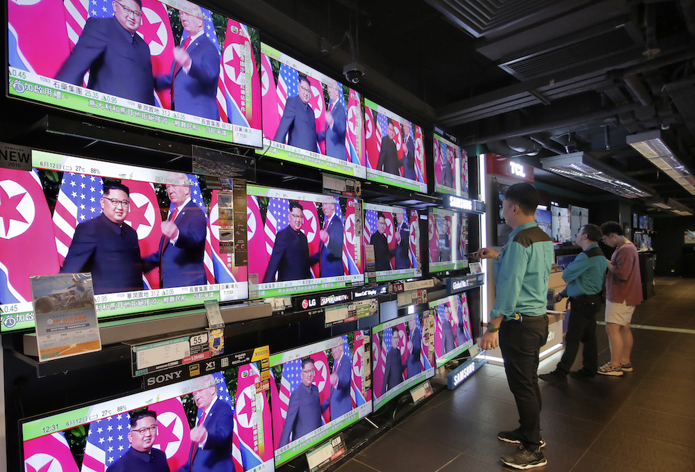 Trump Kim summit on TVs in Hong Kong