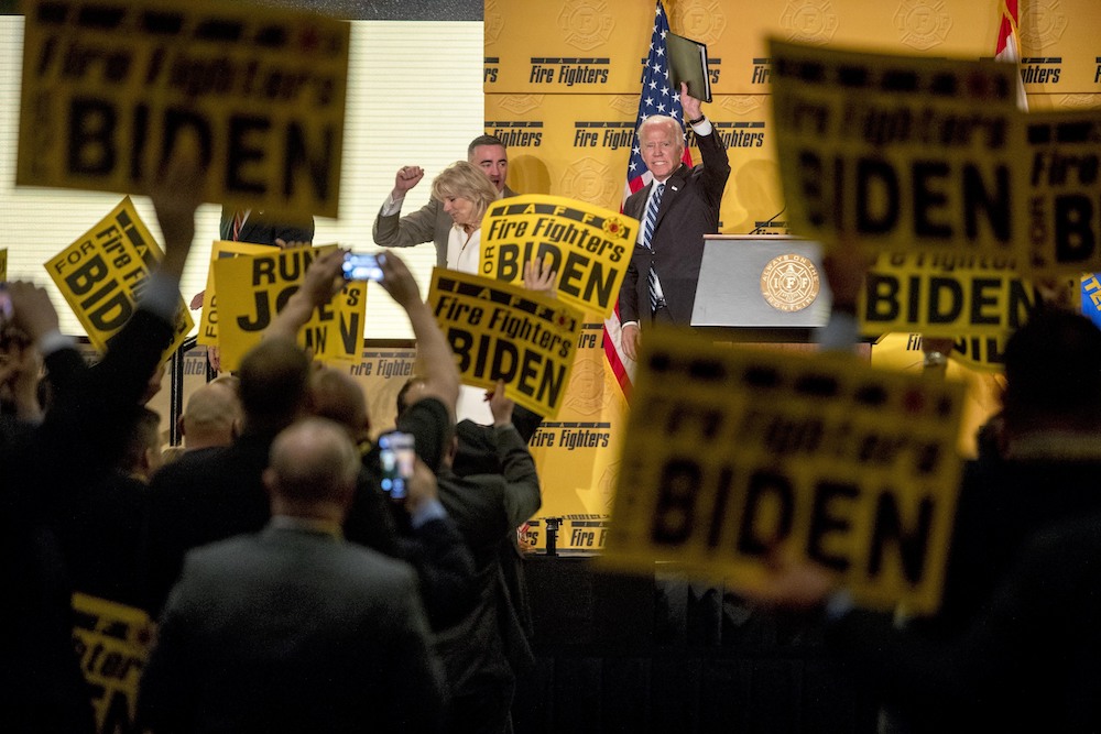biden with firefighters AP photo 2019