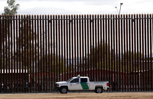 border fence and border truck