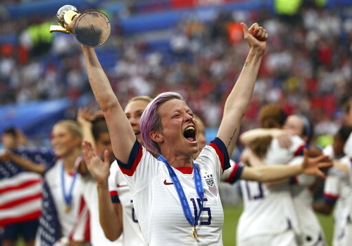 Rapinoe and trophy