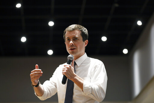 pete buttigieg with microphone in iowa dec. 6