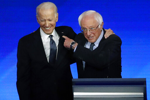 biden embracing sanders NH debate Feb 2020
