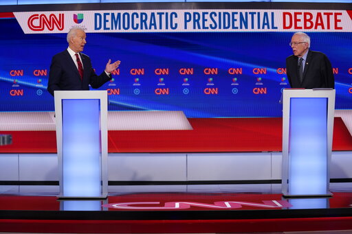 biden talking to sanders on stage dem debate march 15 2020