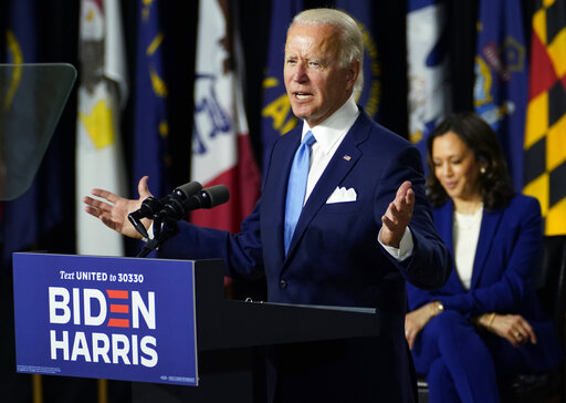 joe biden at podium, harris sitting aug 12 2020
