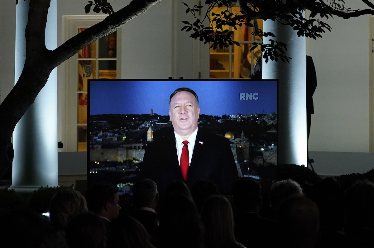 Mike Pompeo shown on tv in rose garden
