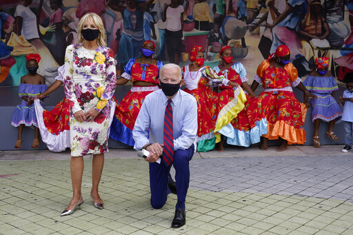 Biden kneeling Miami