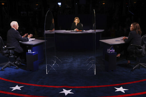 mike pence and kamala harris facing debate moderator