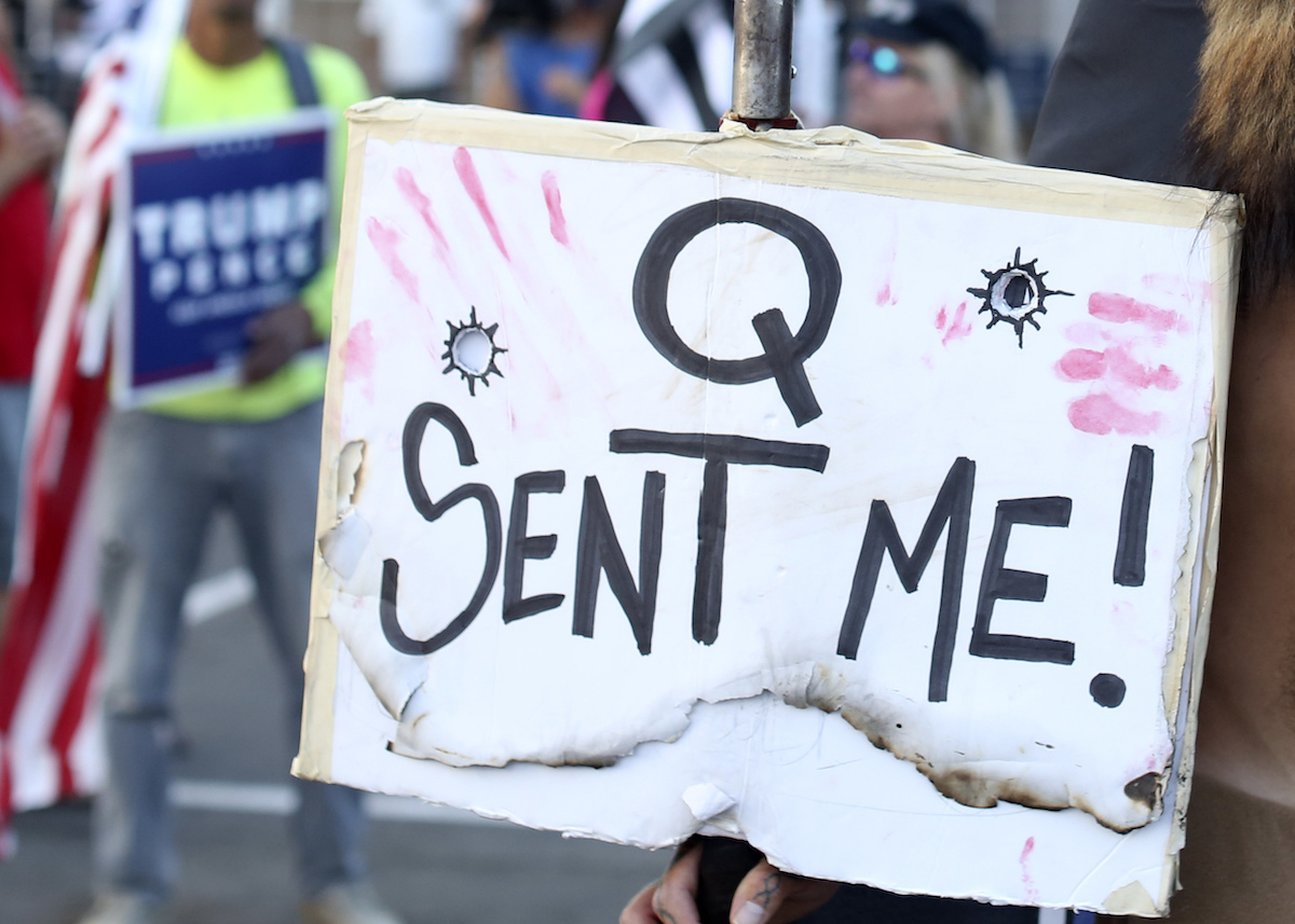 QAnon sign Jan. 6, 2021 for Juan O Savin story