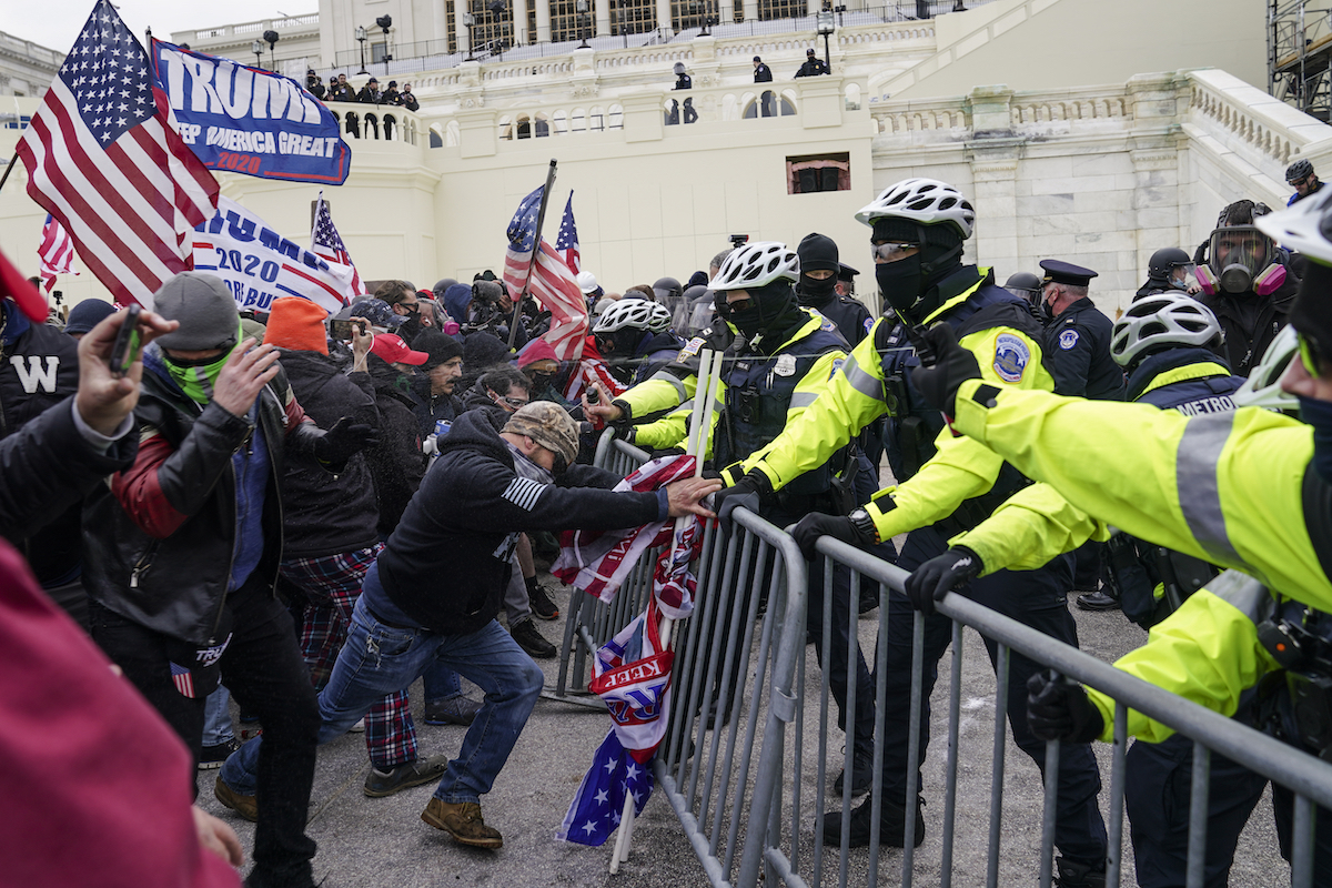 Rioters push police barrier Capitol Jan. 6