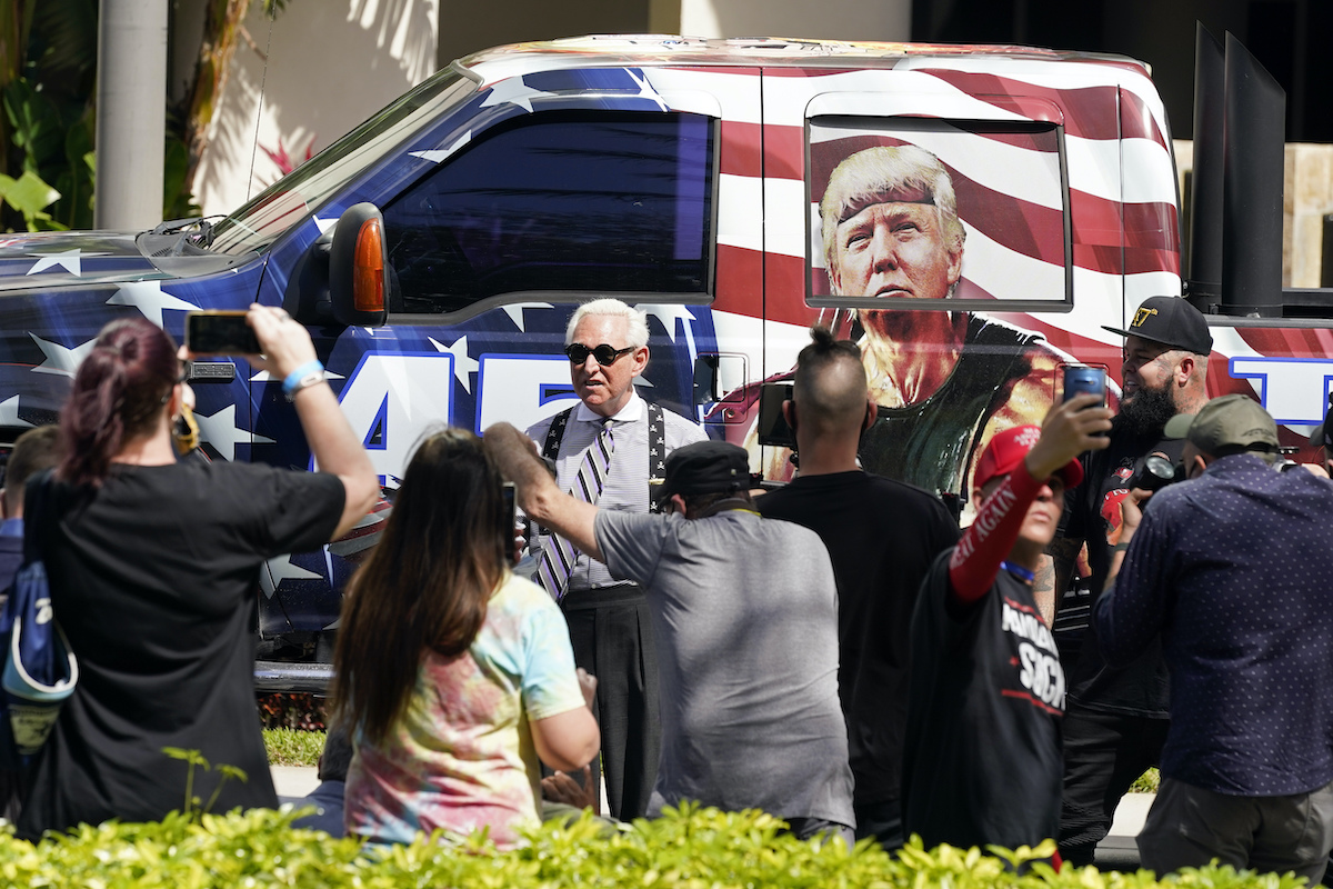 Roger Stone at CPAC in front of a Trump van 2-27-21