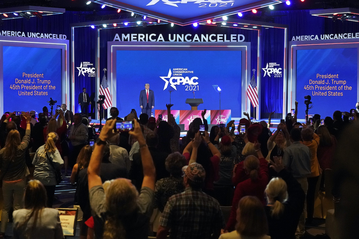 Donald Trump with supporters at CPAC 2021