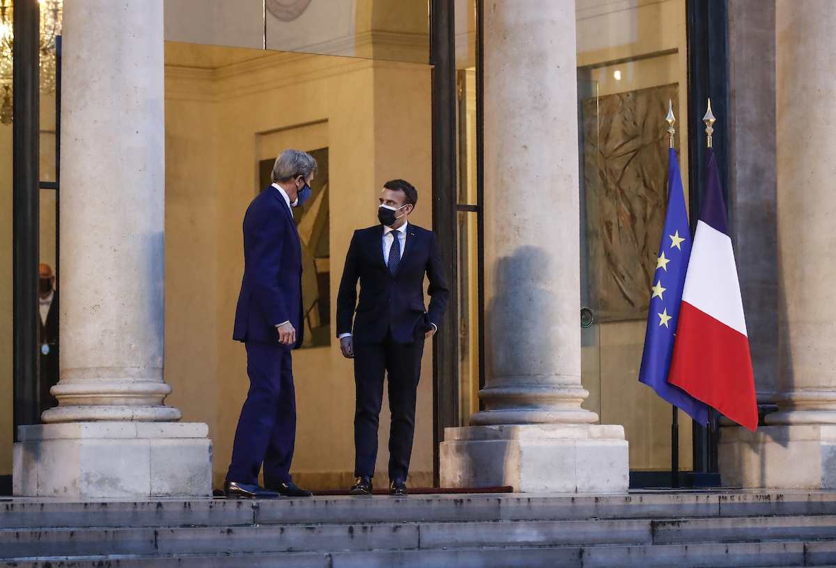 John Kerry Macron climate Paris March 2021 art