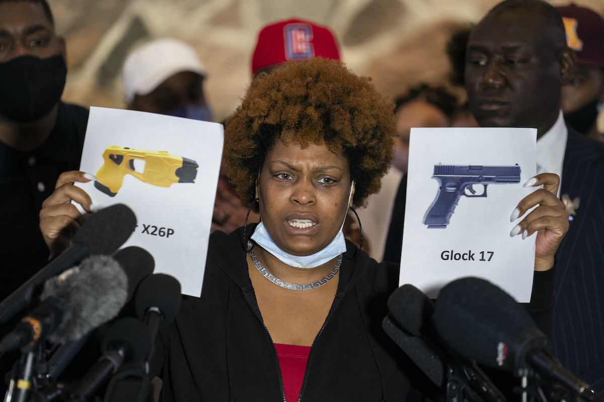 daunte wright's aunt with images of taser and glock