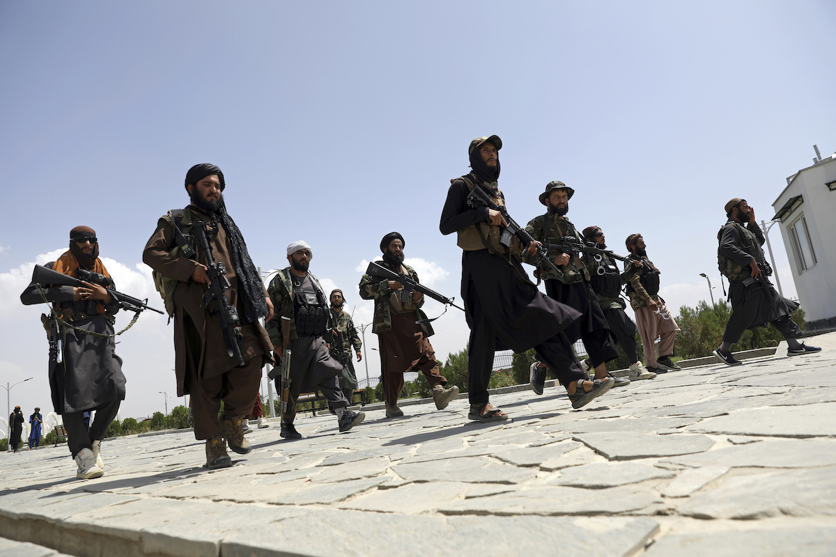 Taliban fighters marching Afghanistan art for Charlie Kirk fact-check