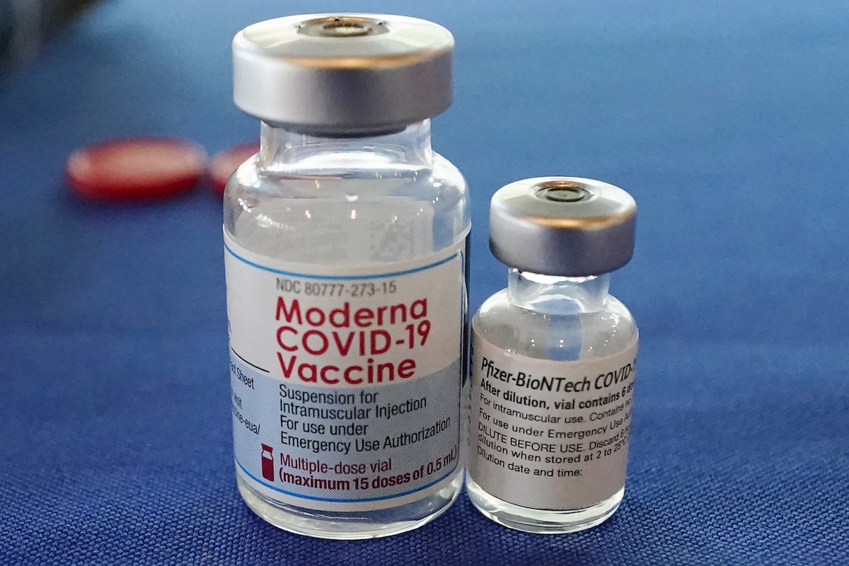 Moderna and Pfizer vaccine vials file photo Sept. 2021