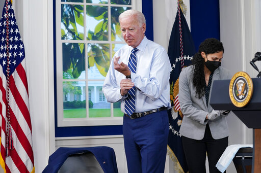 Biden buttoning sleeve