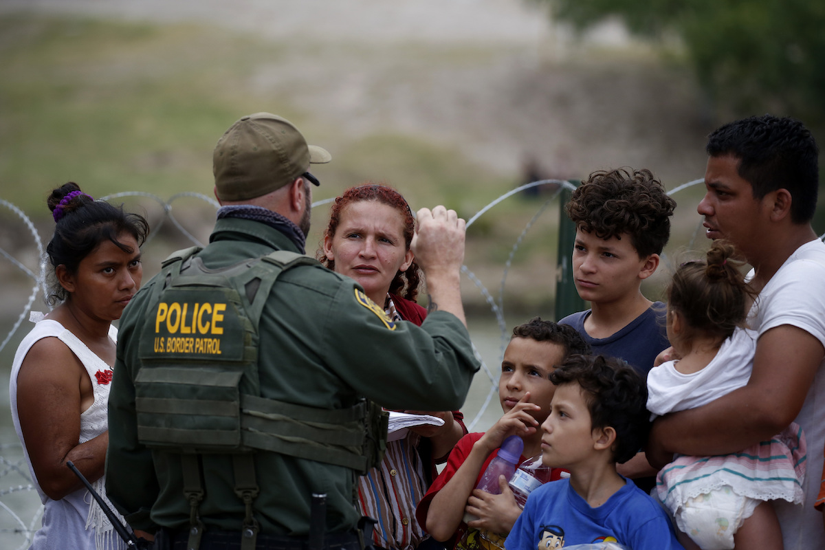 Border Patrol speaks with migrants at Eagle Pass May 22