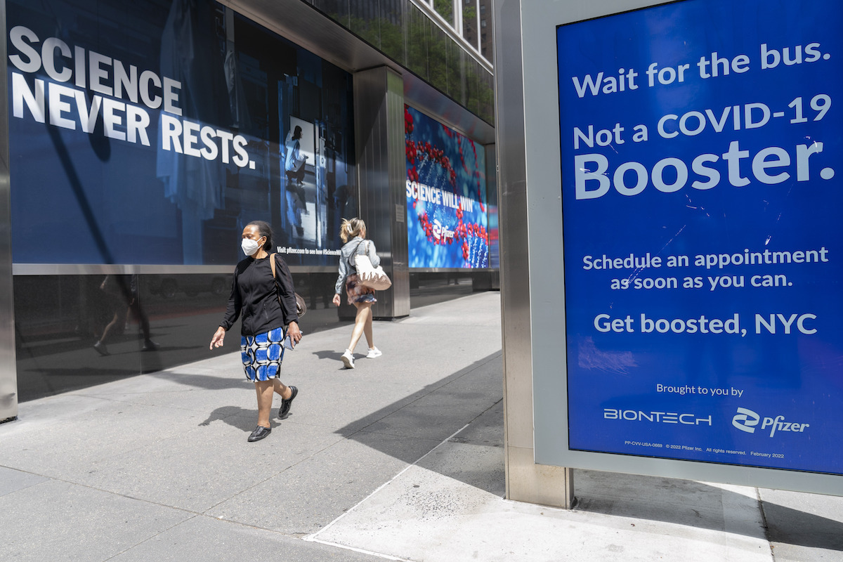 Covid booster shot bus stop ad in NY May 2022