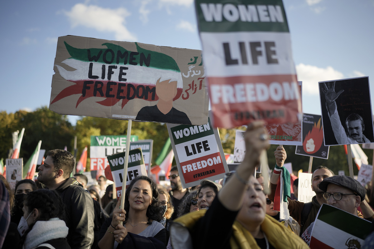 Iran protest in Berlin, Women, Life, Freedom posters