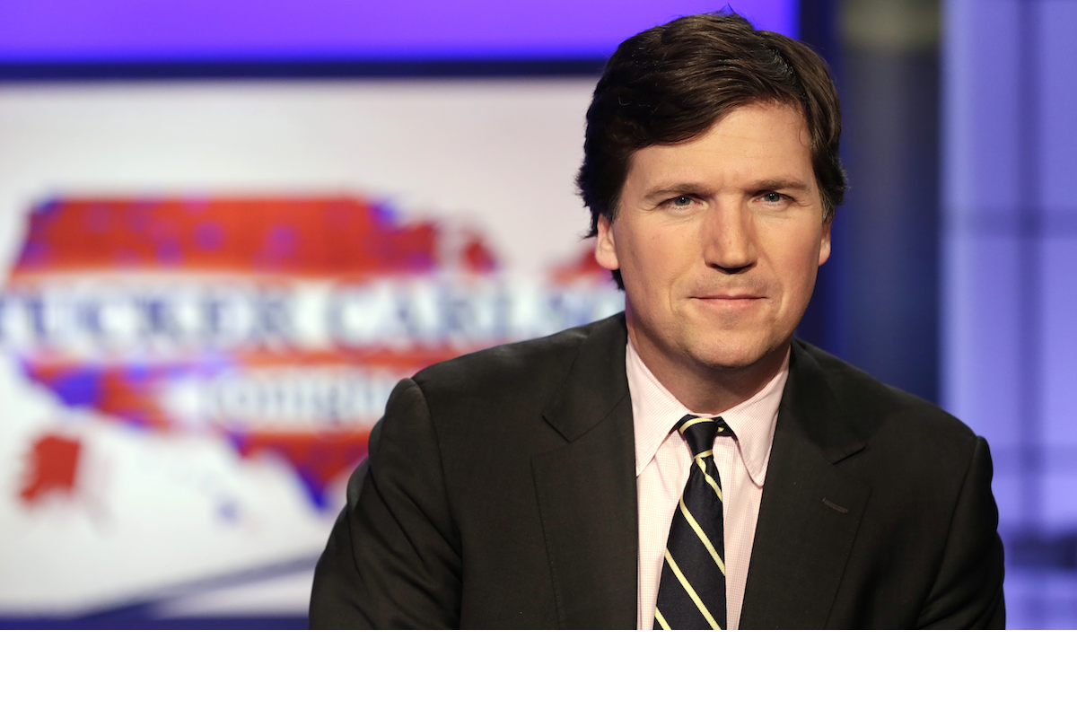 Tucker Carlson photo against show logo