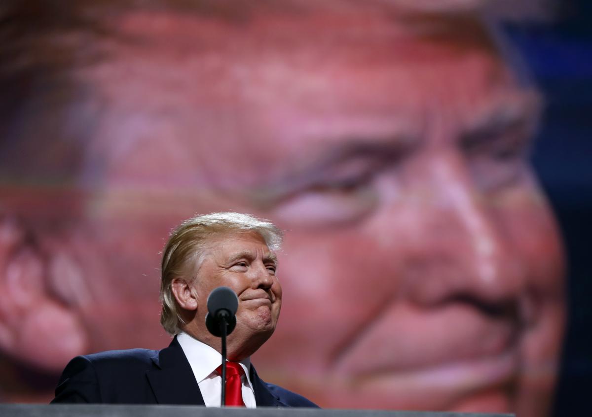Donald Trump at RNC with head imposed on screen