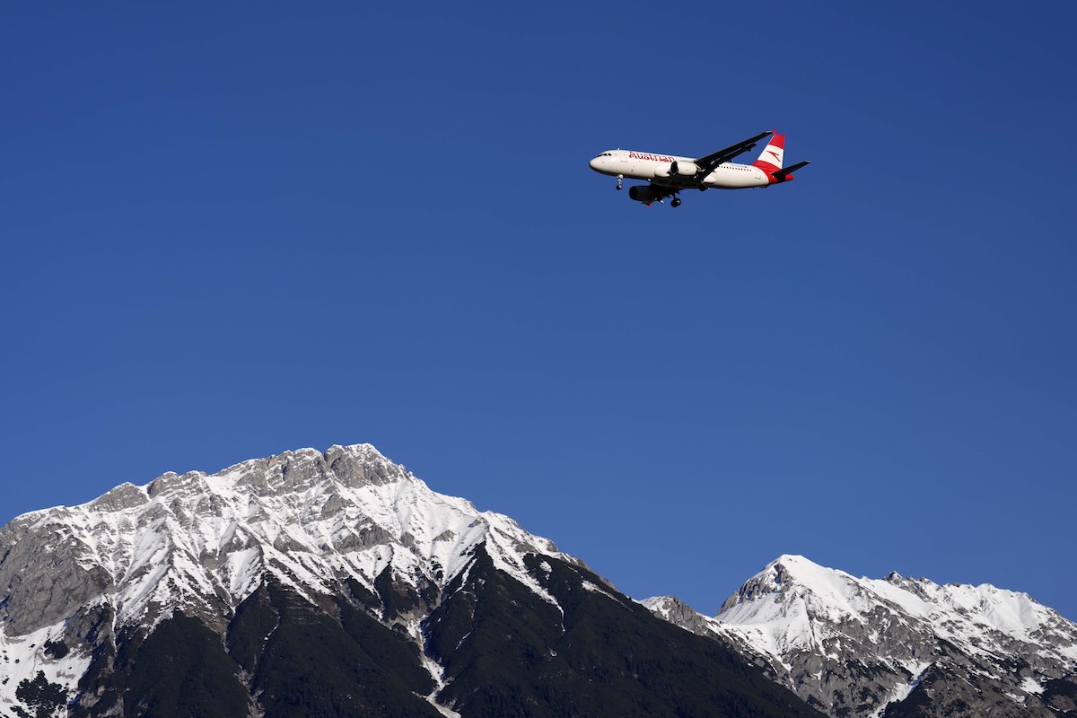 Austrian Airlines plane flies over Alps, 1-2-2023