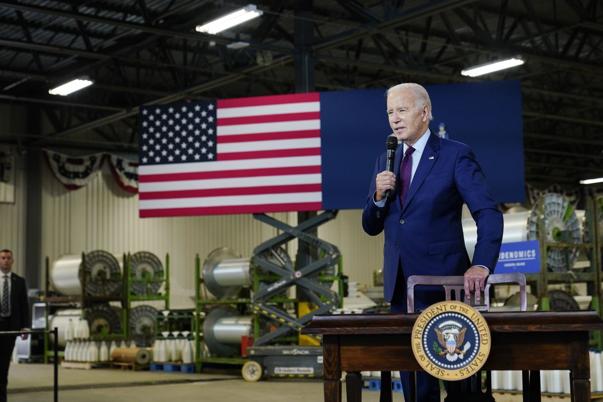 Biden in Maine with flag in Auburn, Maine, 7-28-2023