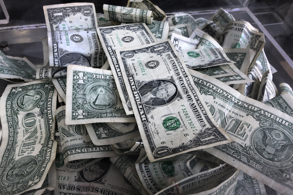 Cash in a tip box 2019