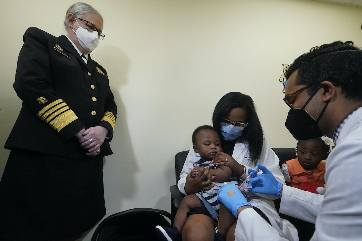 Child receives vaccine in Miami in June 2022