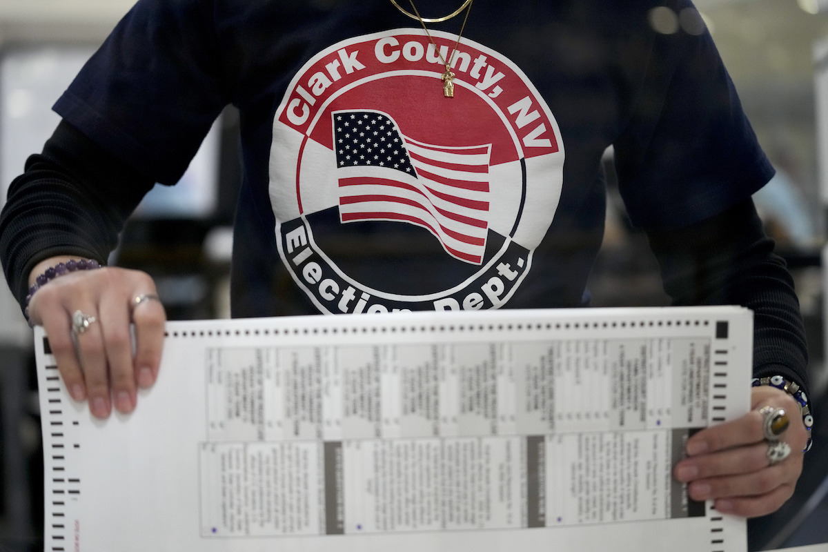 Clark County, Nevada, election worker tabulates mail ballots Nov. 9, 2022