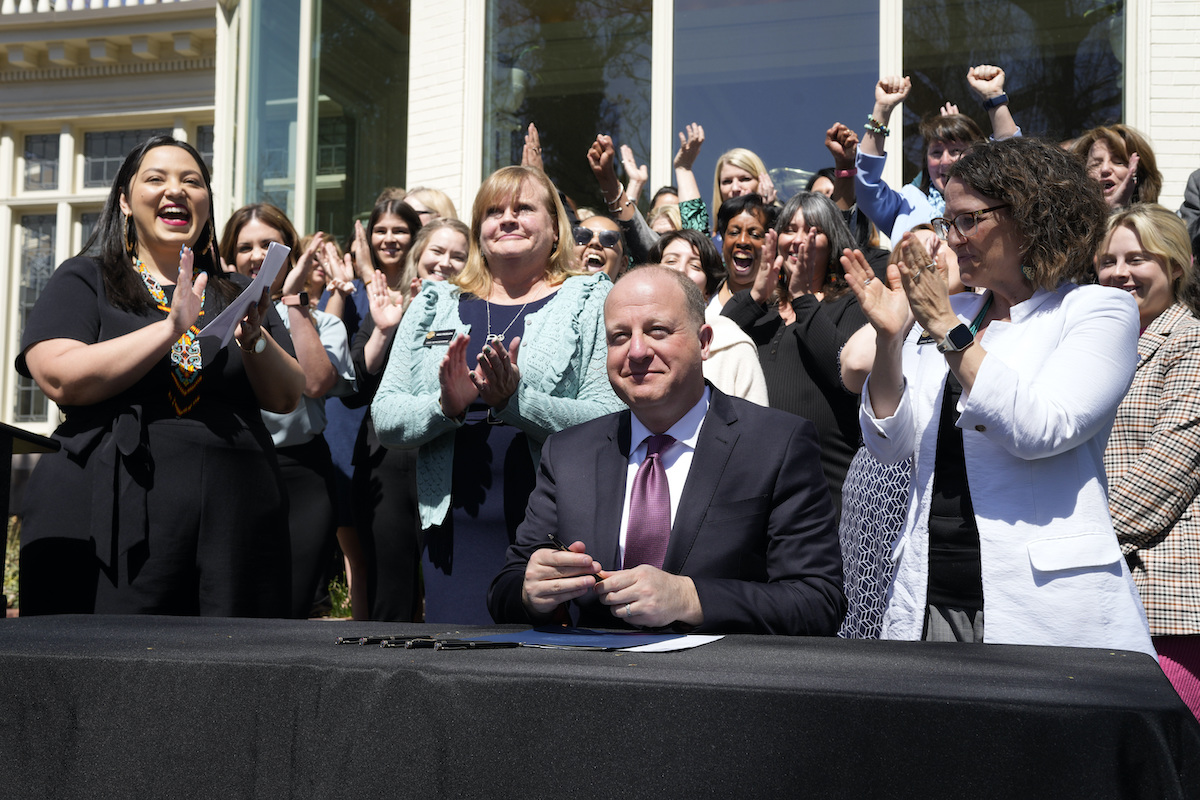 Colorado Gov. Polis signs abortion law