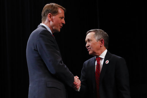Cordray and Kucinich shake hands at debate 2018