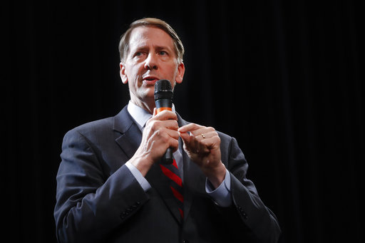 Richard Cordray plain black background 2018