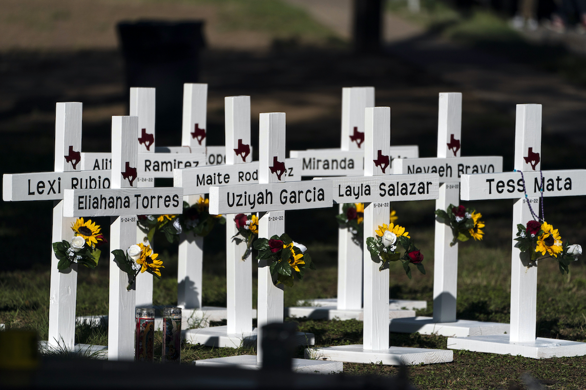Crosses with the names of the Uvalde shooting victims at school on May 26