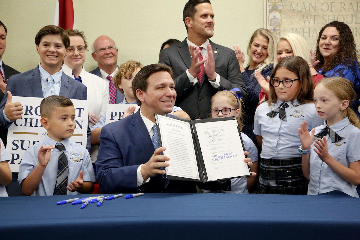 DeSantis signed 'don't say gay' bill with schoolchildren 3-28-22