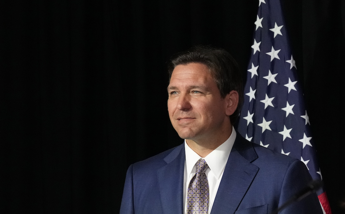 Ron DeSantis smiling at crowd on Feb. 15, 2023